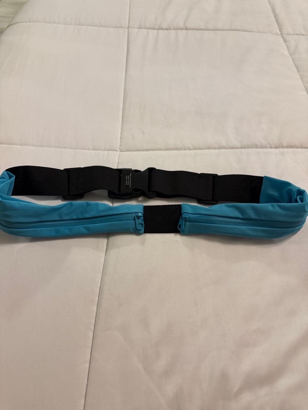 Adjustable Black Waist Belt with Bright Blue Zippered Pouches